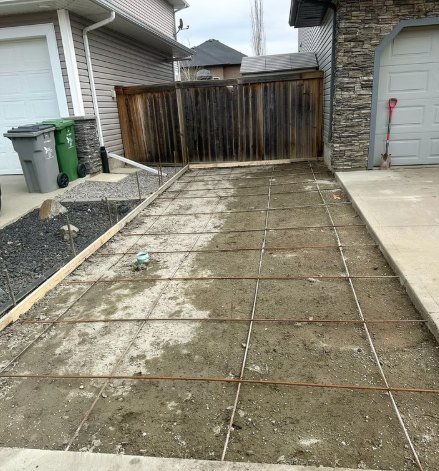 Driveway area dug out with forms and rebar in place